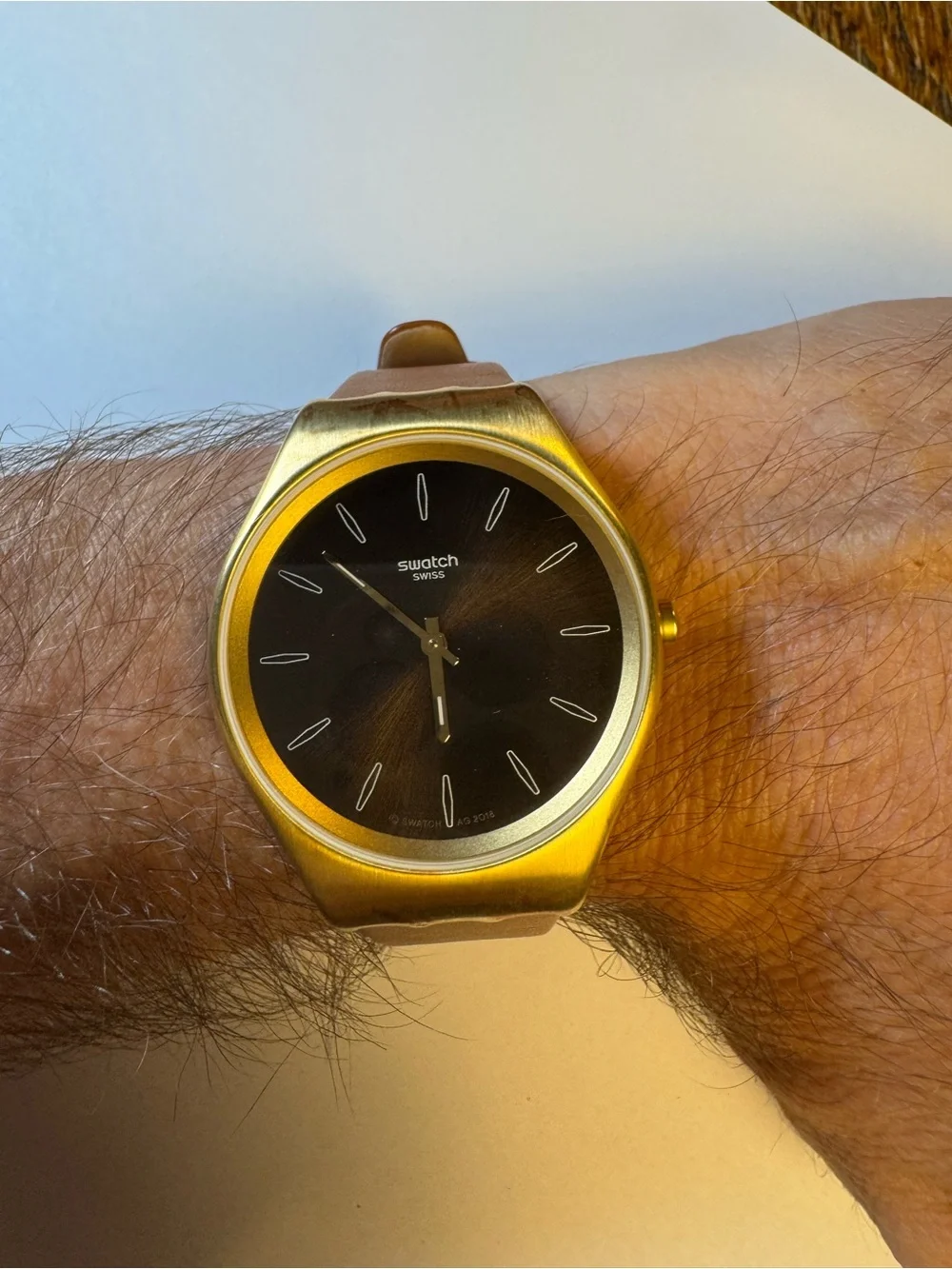 Swatch Skinsand SYXG104 gold-tone and leather analog watch